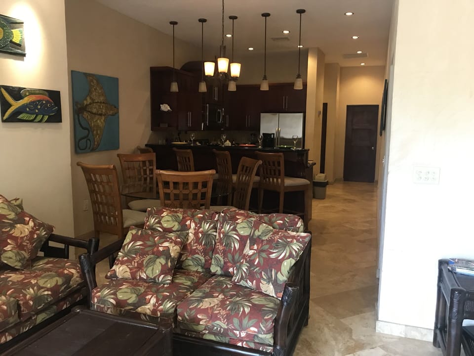 View from living room to kitchen then hall to 2nd bedroom and bath