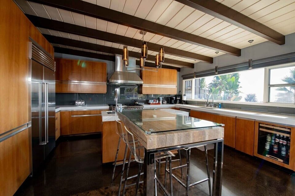 Open concept bright gourmet kitchen designed by Bravo's Jeff Lewis.
