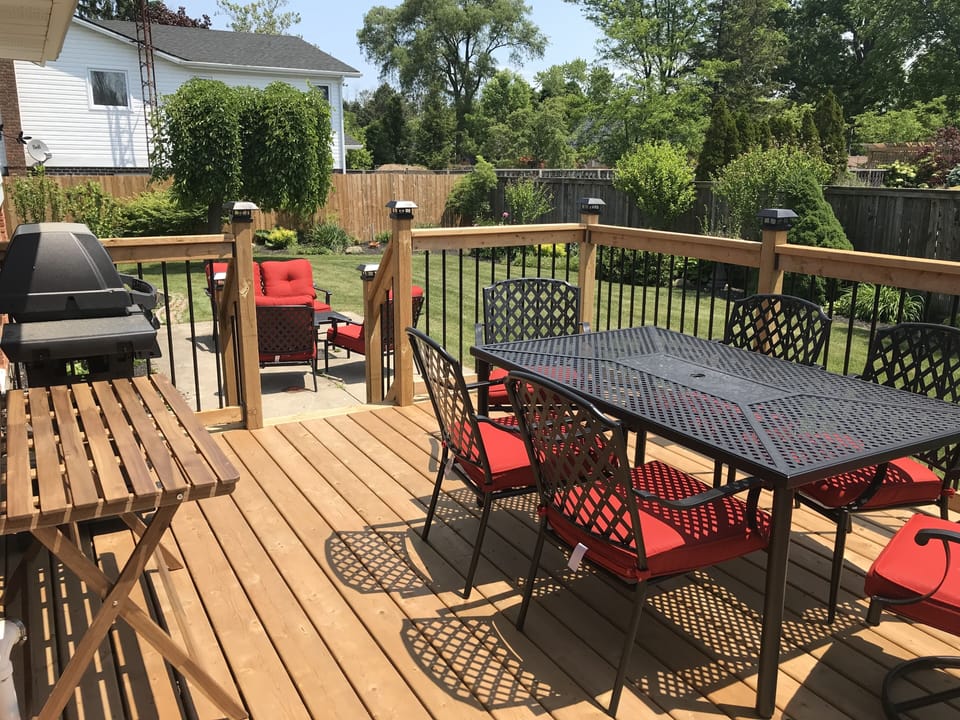 Outdoor Dinning with Bbq and conversation area beyond