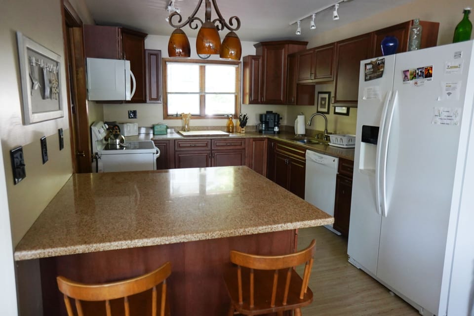 Updated kitchen w/ seating for 4
Dishwasher, microwave, keurig & reg coffee pot