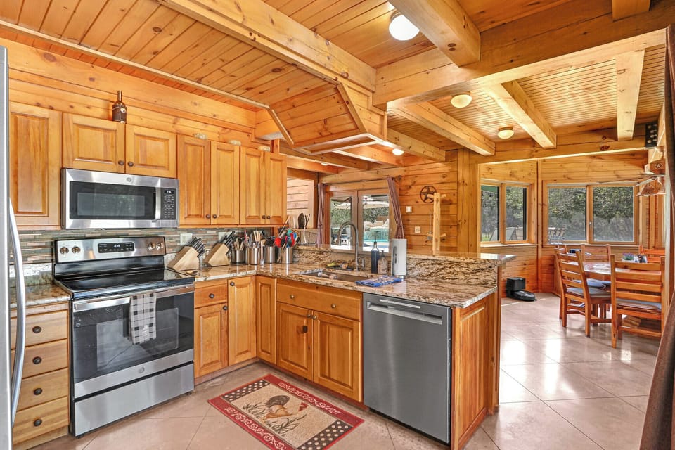 Full kitchen with stainless steel appliances