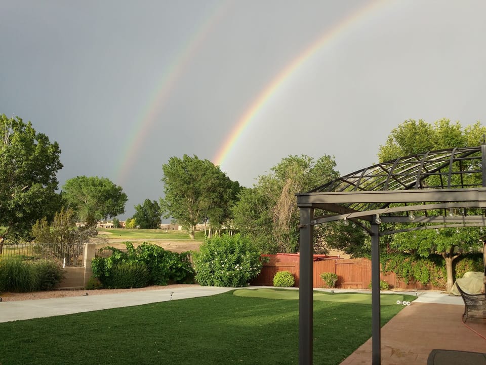 Double rainbows clear to reveal Sangre de   Cristo Mt. view. Resort-style living