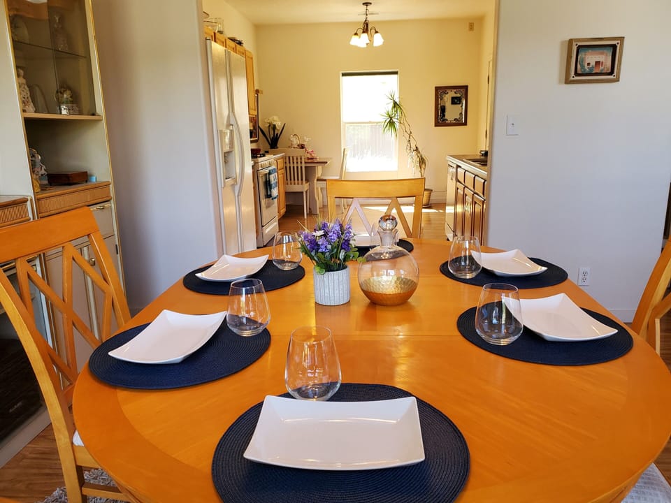 Diningroom table seats 6, 2 more at breakfast bar, 4 more at kitchen table