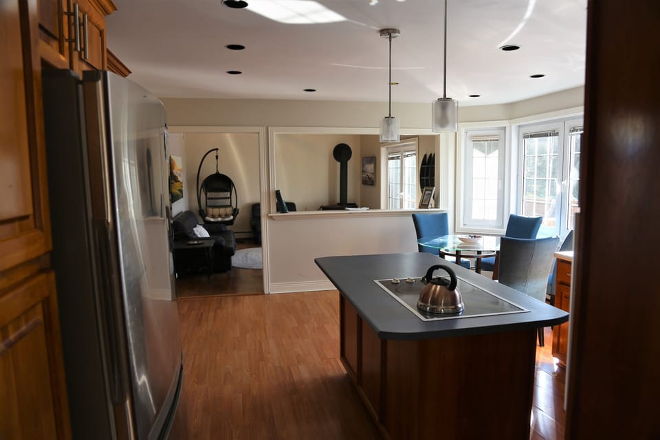 Kitchen looking towards sunroom.