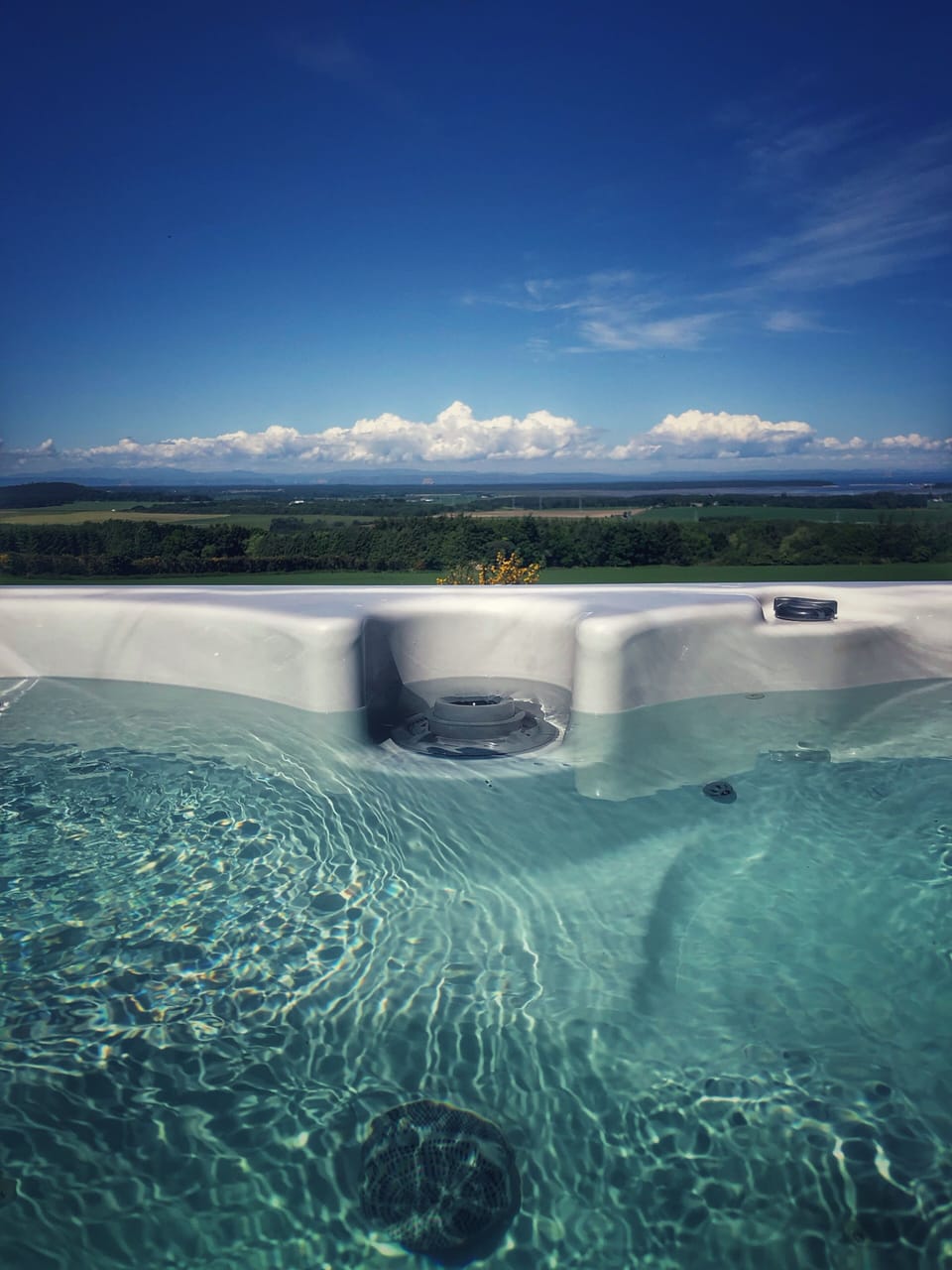 The view of the Moray Firth from the hot tub at Ben Wyvis lodge.