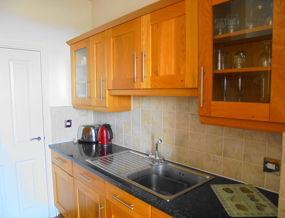 Kitchen with door to balcony