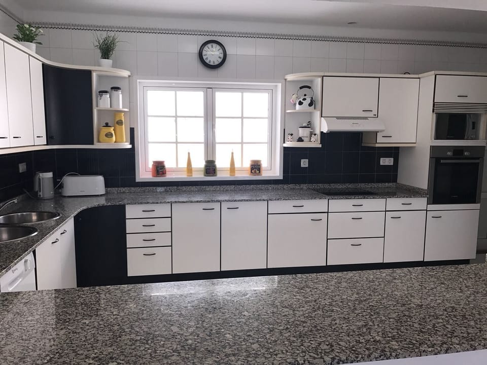 Kitchen and serving hatch