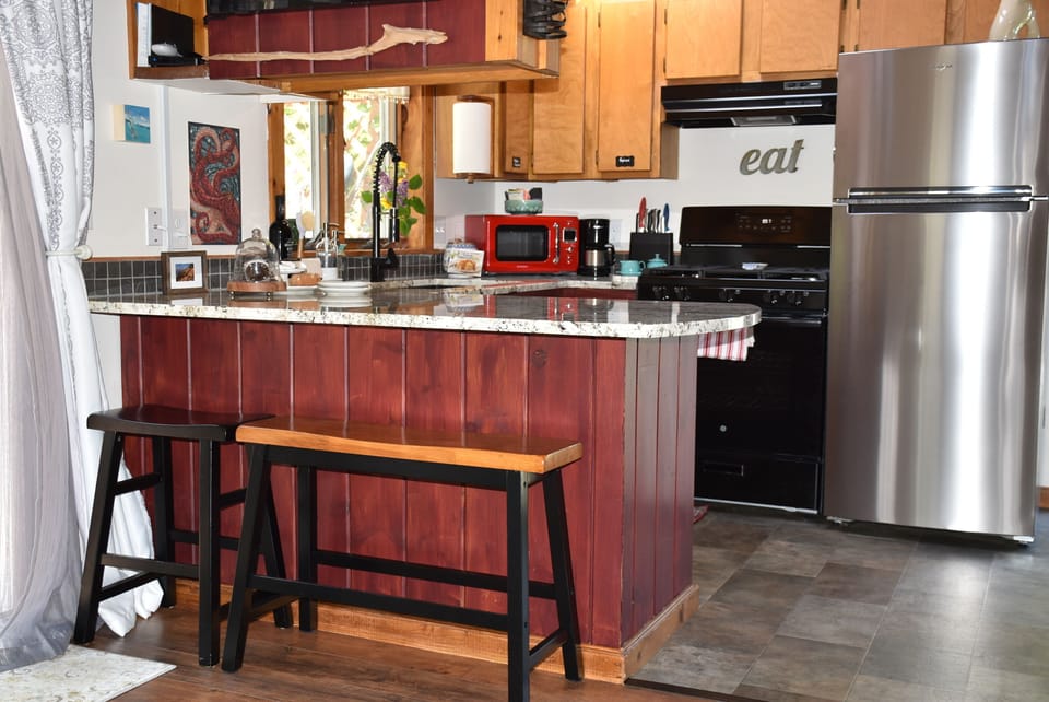 Kitchen: NEW gas stove,  refrigerator, eat in & rustic charm. 