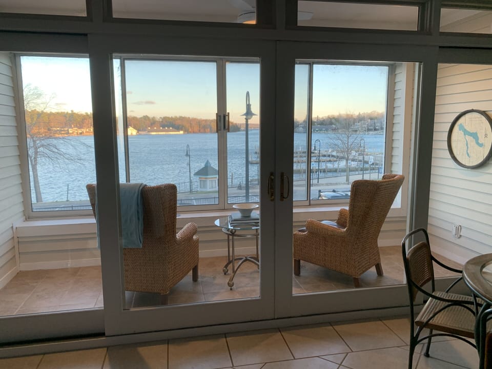 Stunning views of marina and Round Lake. Open your sliders for pure MI breeze.