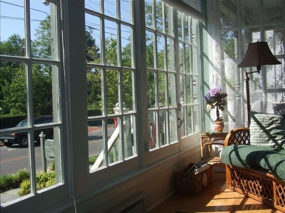 A view from sun porch which looks upon Southern Mansion-Washington St. 