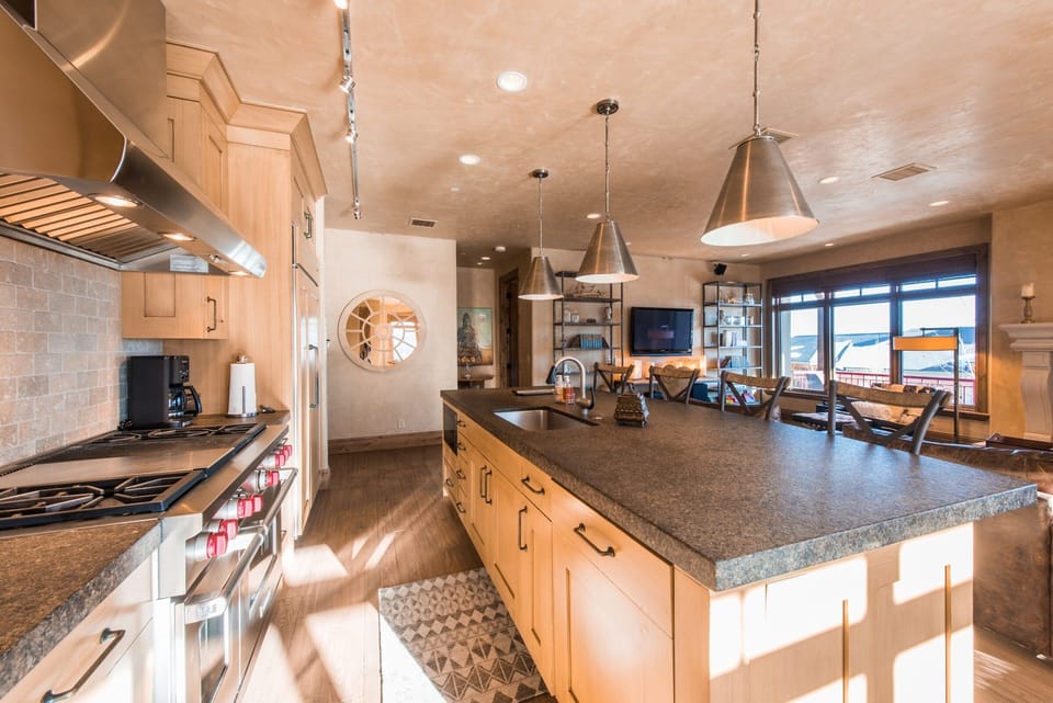 Large kitchen with bar seating. 
