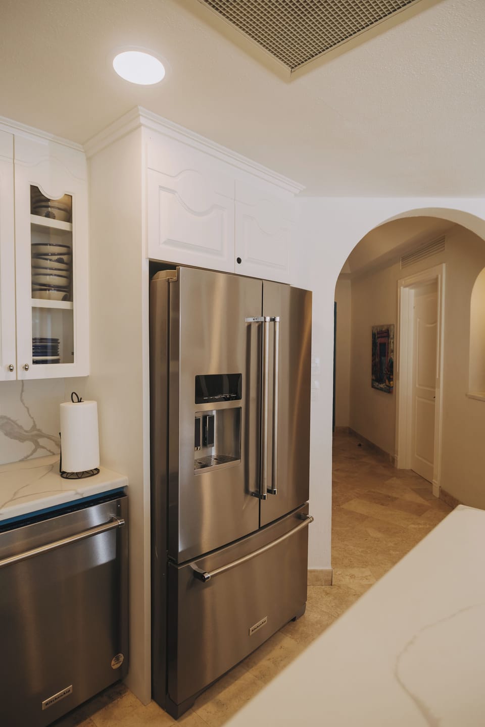 Kitchen area next to entry.  Brand new refrigerator.
