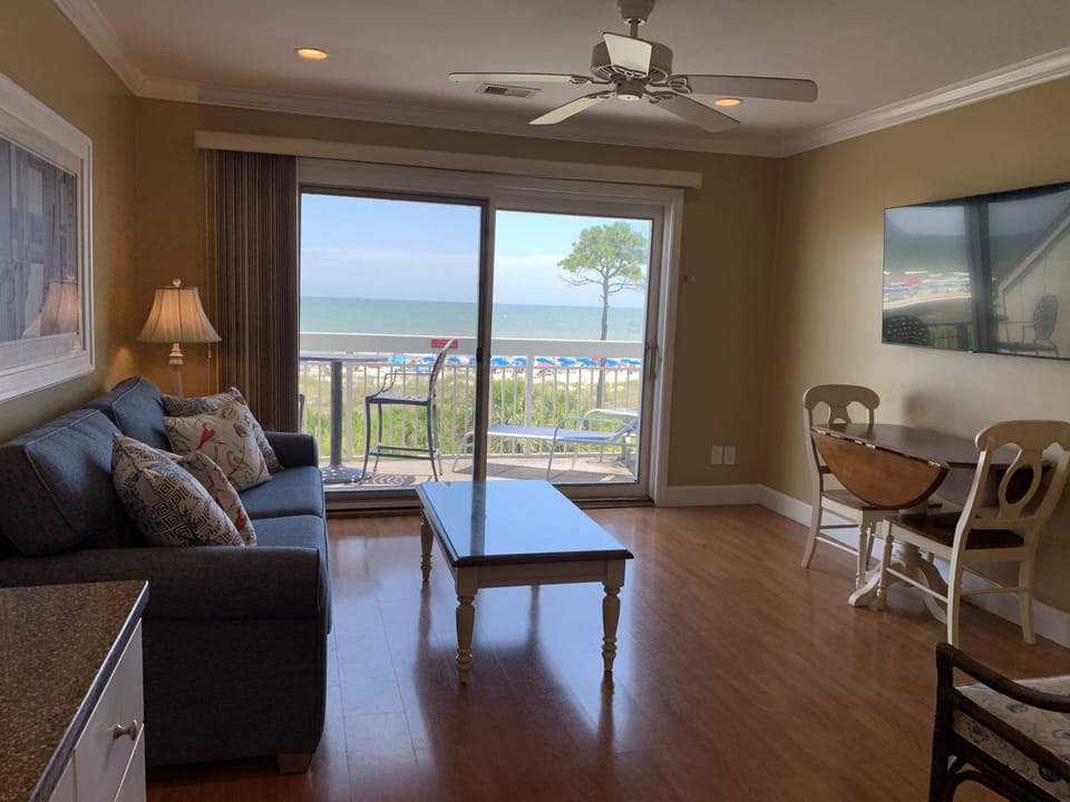 View from kitchen into the Living Room and direct oceanfront