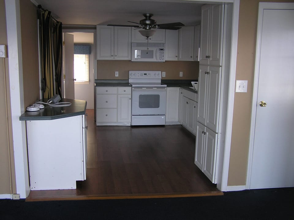 spacious kitchen with stove/oven, microwave, refrigerator, coffeemaker 