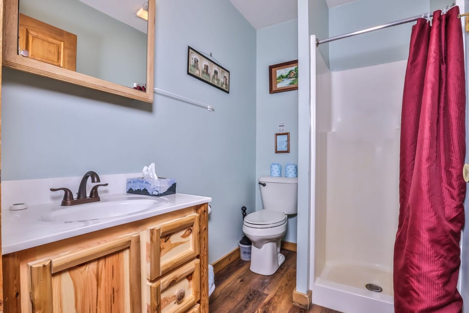 Cozy little bathroom with a stand up shower