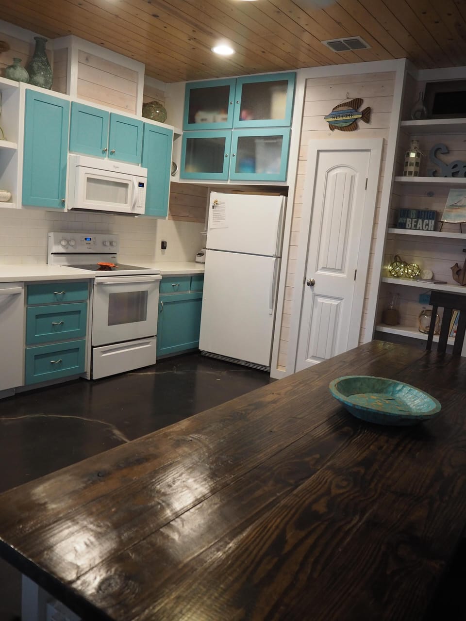 Cooktop, Microwave, Refrigerator, and pantry.