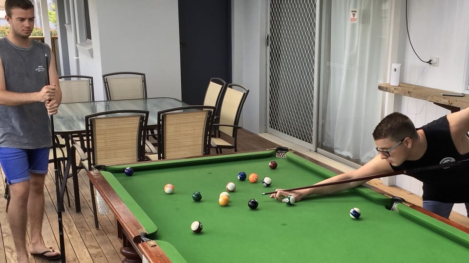 Enjoy a game of pool on the back deck