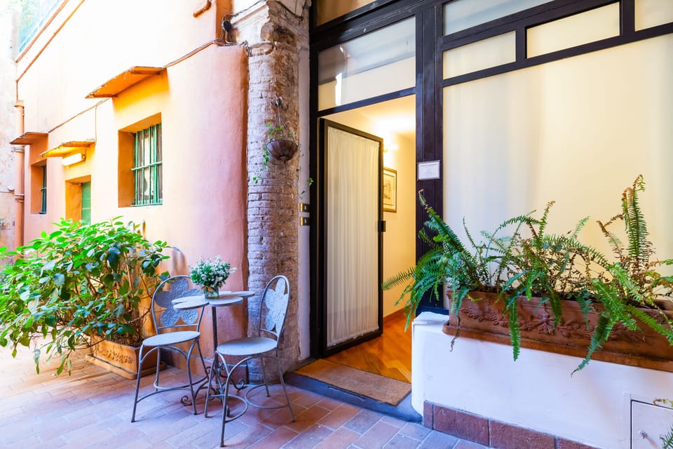 Outdoor courtyard with a small table.