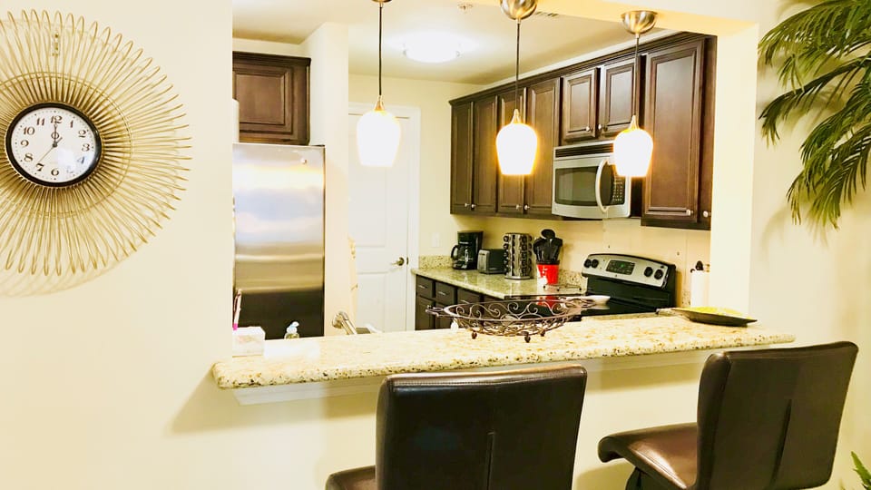 Large Kitchen with Stainless Steel appliances