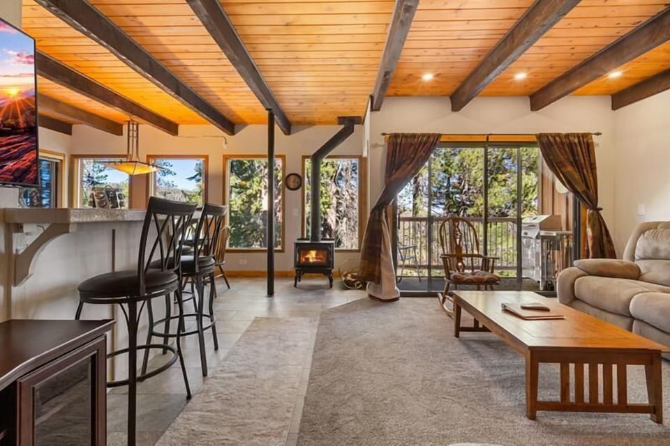 Enjoy a warm fire and take in the mountain views