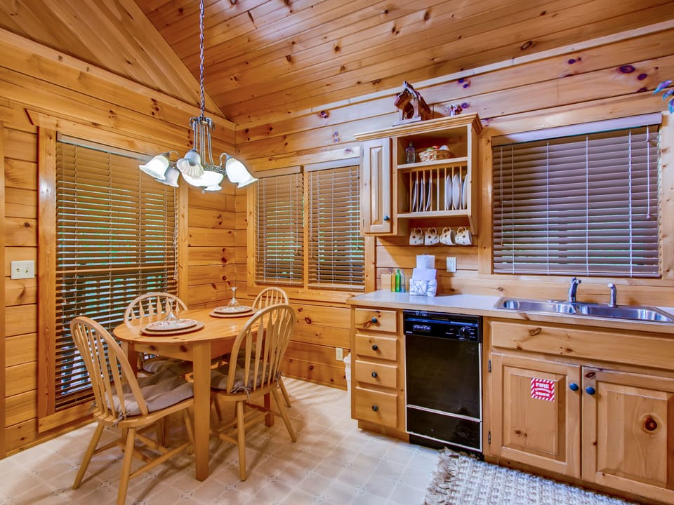 Cozy nook perfect for dining or games. Rustic yet stylish kitchen is ready for all of your cooking needs.