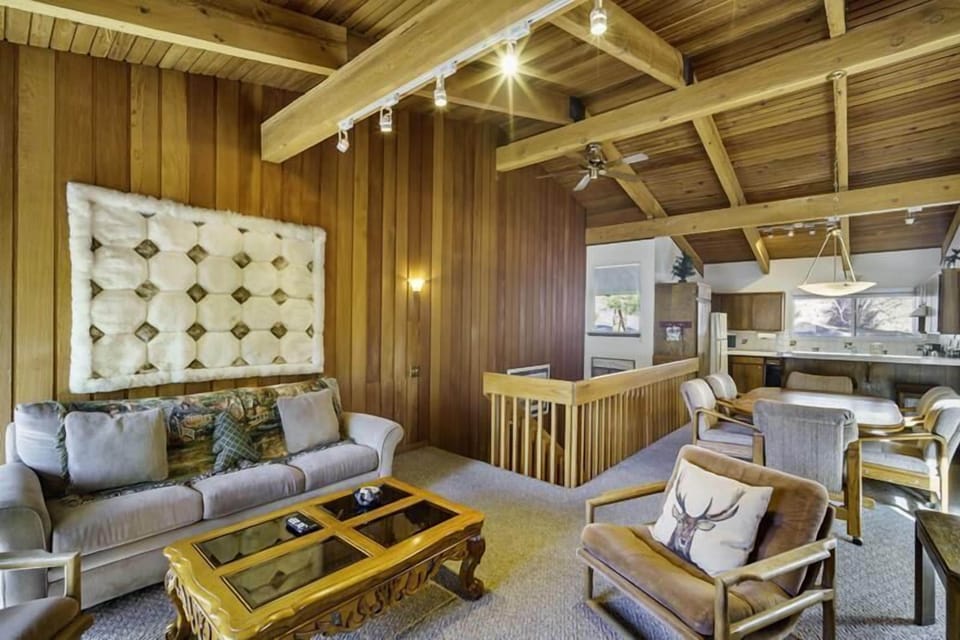 Wood beams add a cabin feel with udpated features
