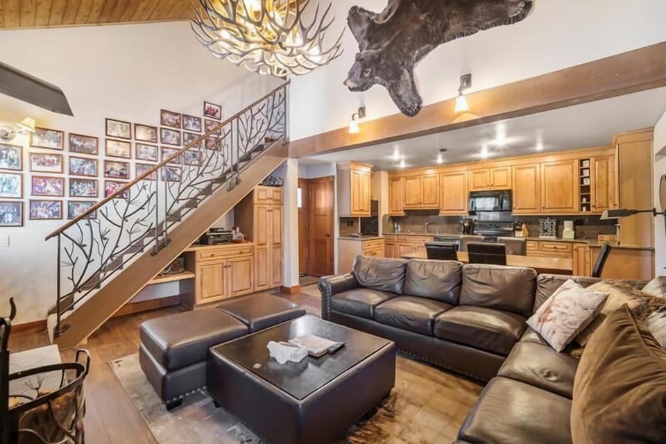 Decorative staircase and mountain accents.