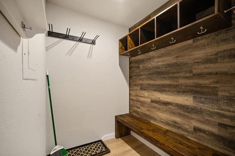 Entry bench and storage for clothing and equipment