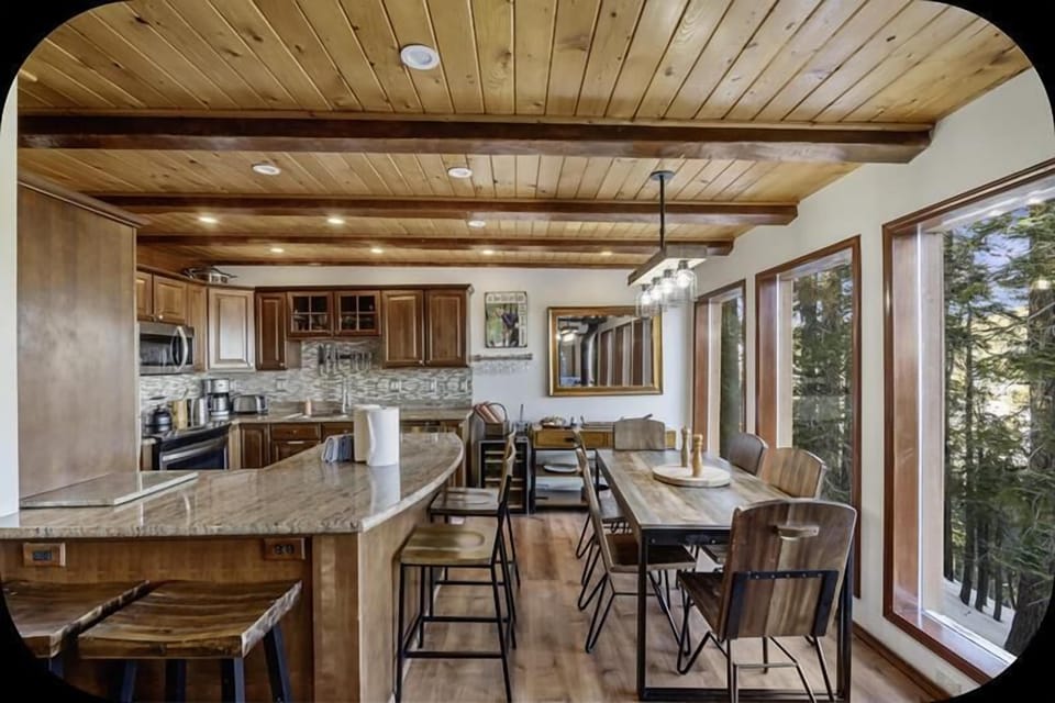 Kitchen and dining area with a wall of windows!