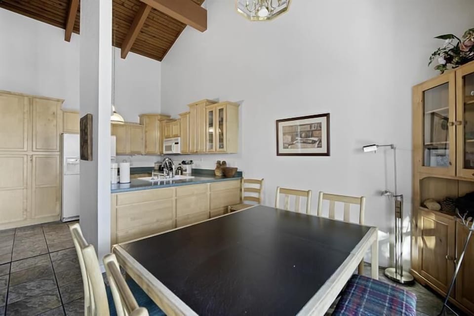 Dining to kitchen area, makes for easy serving.