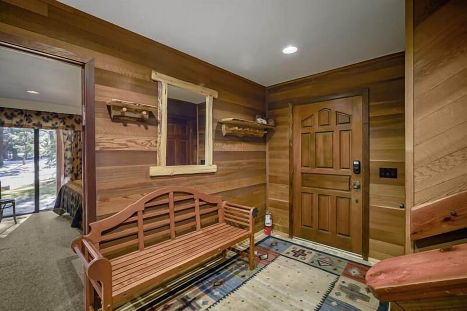 Entry with coat storage and bench for shoes/boots