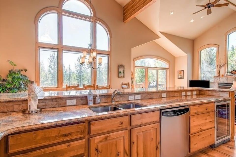 Full kitchen on main level with stainless GE profile appliances.