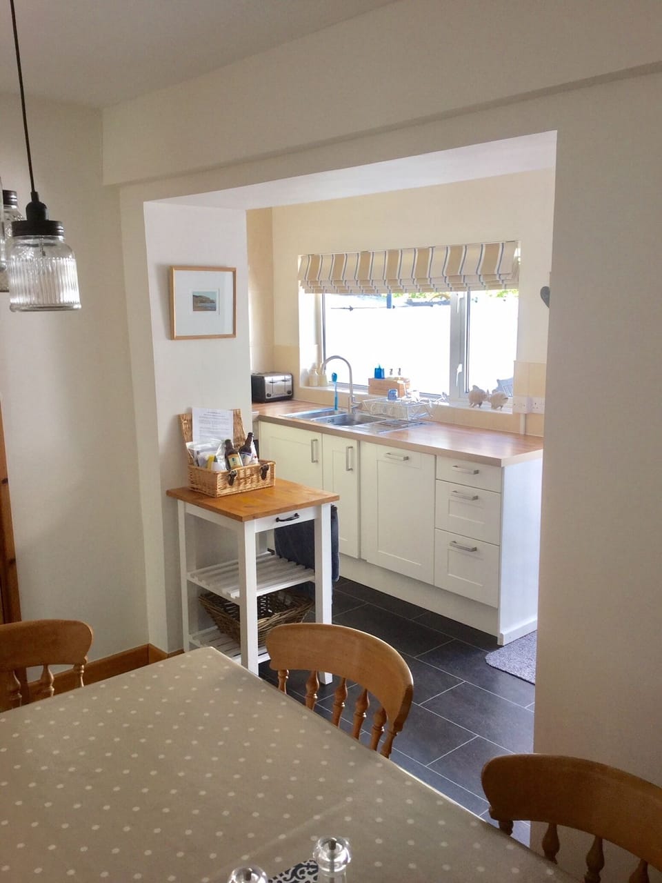 The light and airy kitchen , as seen from the kitchen table 