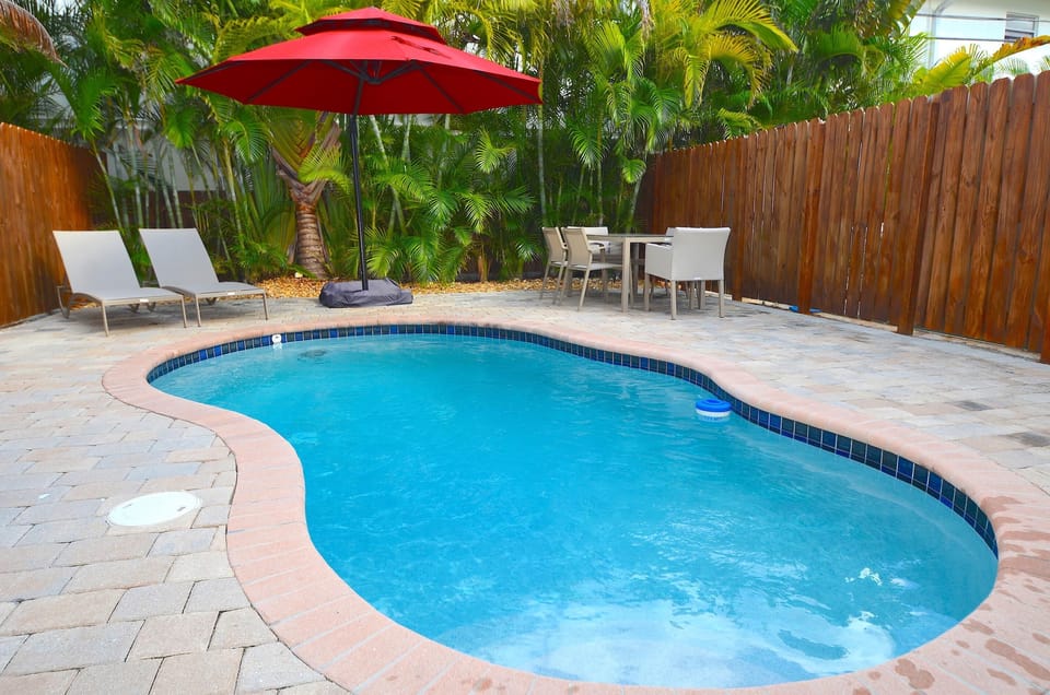 Spectacular Private Rear Yard Features Heated Pool Lounge + Dining...