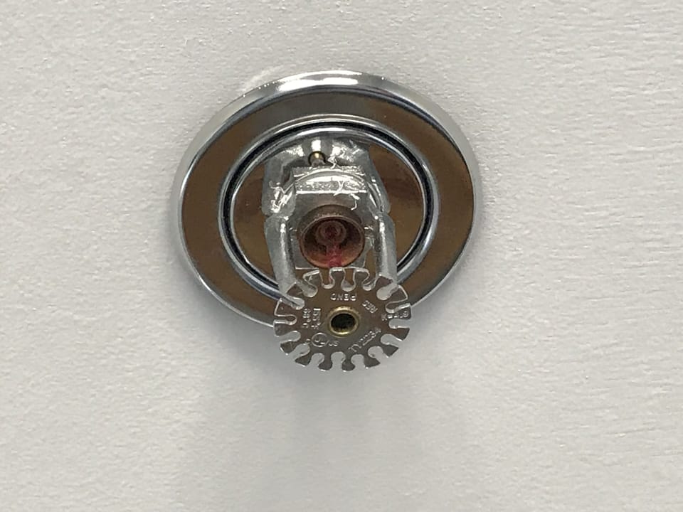 Fire sprinklers and alarms throughout the building for your safety