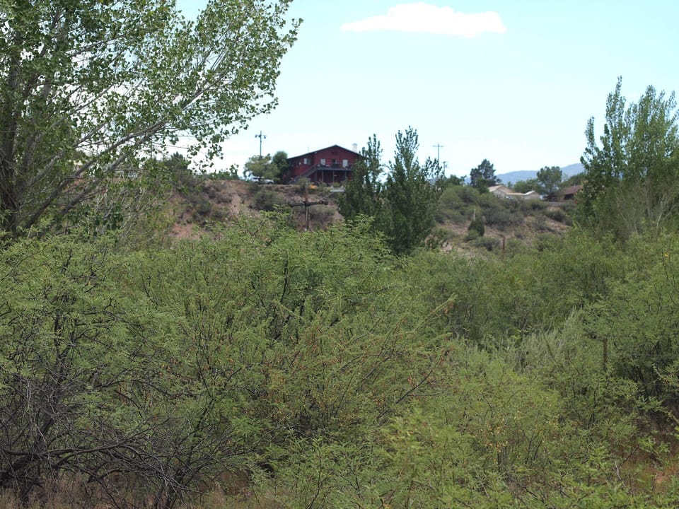 The lodge seen from the hillside, below