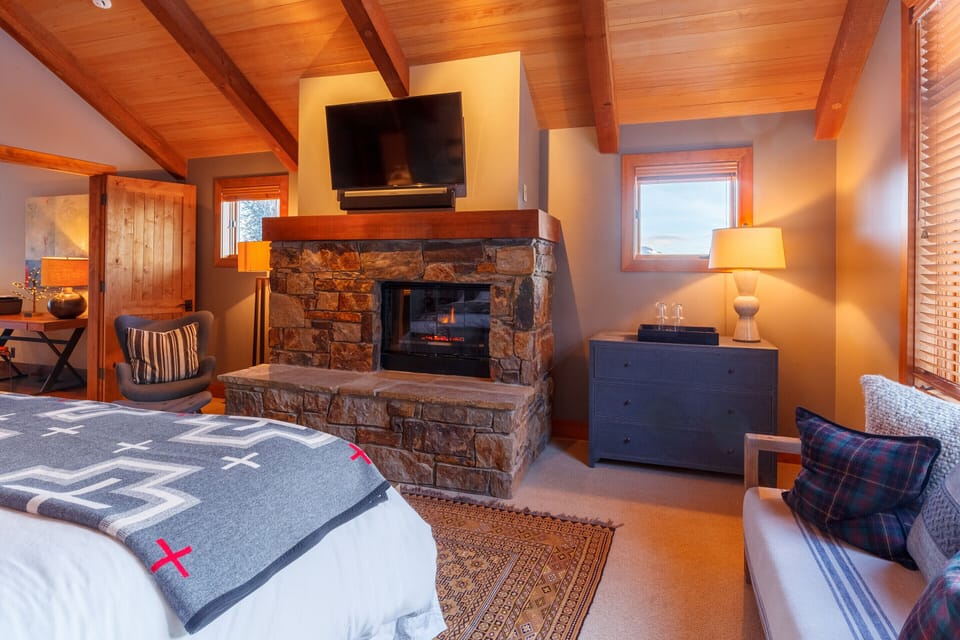 Creature comforts such as TV & Fireplace ensure total relaxation in the Master.