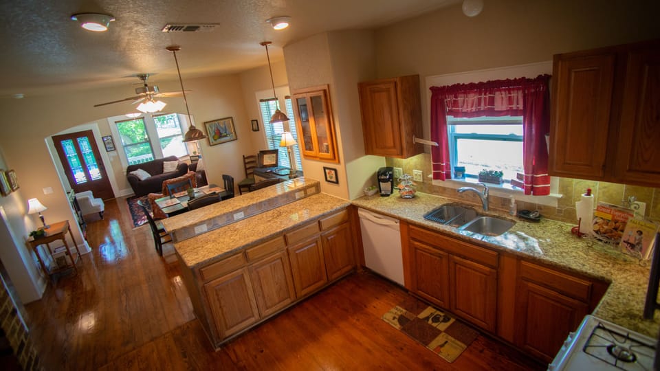 Kitchen looking back to living area