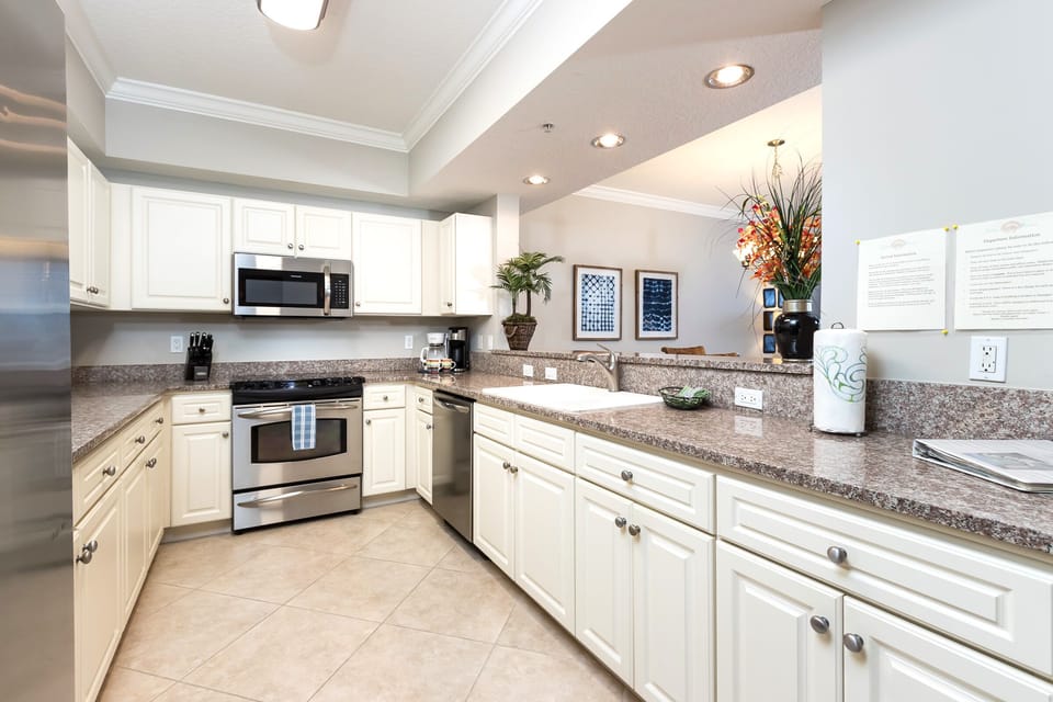 Granite countertops and stainless appliances in our kitchen with plenty of space