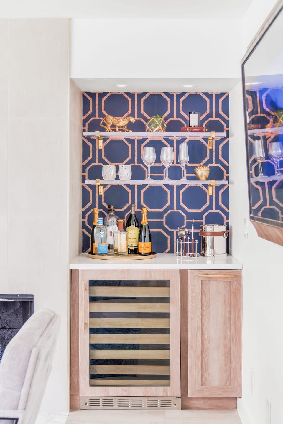Custom bar with Built in Monogram Wine cooler and quartz counters