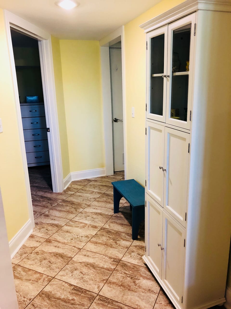 Downstairs hall between bathroom, bedroom, and laundry room