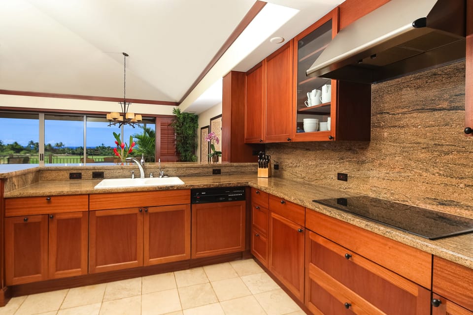 Gourmet Kitchen - opens to the  living areas and outdoors