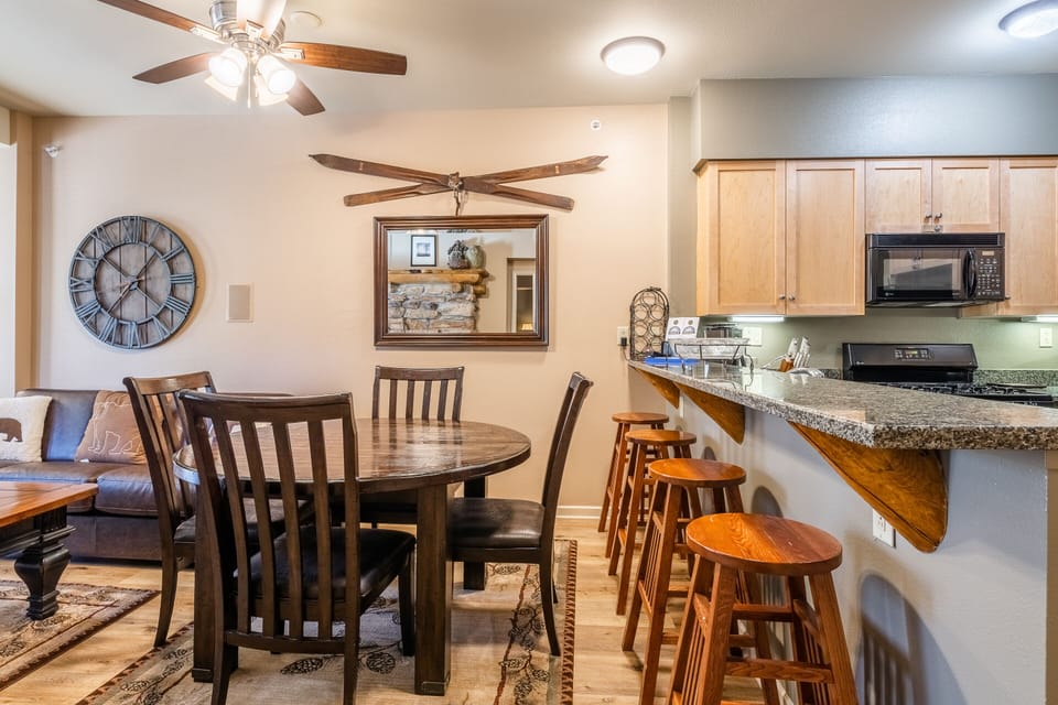 Kitchen Bar plus 4 Stools / Dining Table for 4 / Living Room / Queen Sleeper Sofa / Gas Fireplace / Flat Screen TV + Surround Sound
