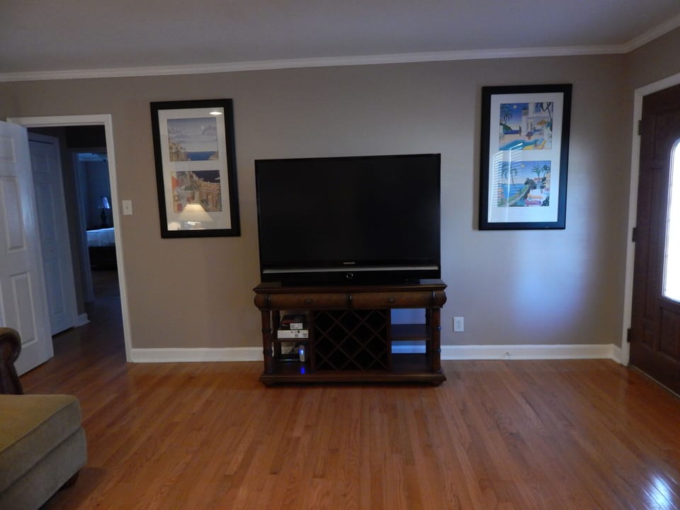 55 inch TV in Living Room with DVD player and Wireless internet connection