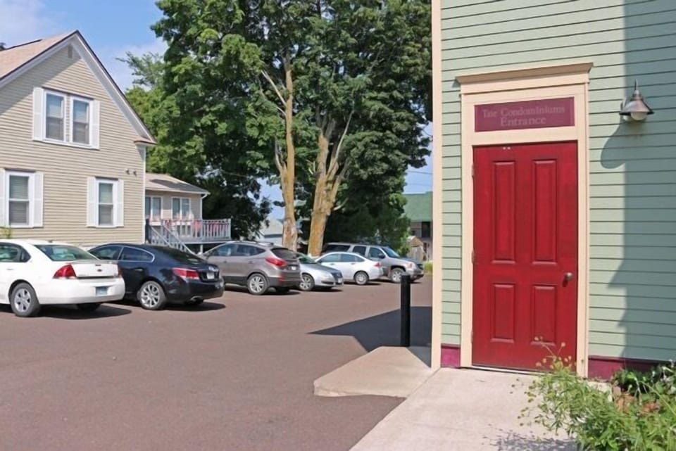 Private parking for 2 vehicles, just steps from entrance door to up stairs. . 