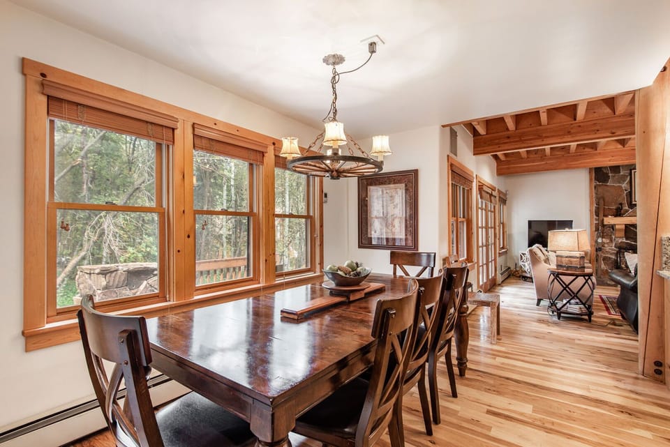 Dining table off kitchen seats 6, plus bar seating for 4.