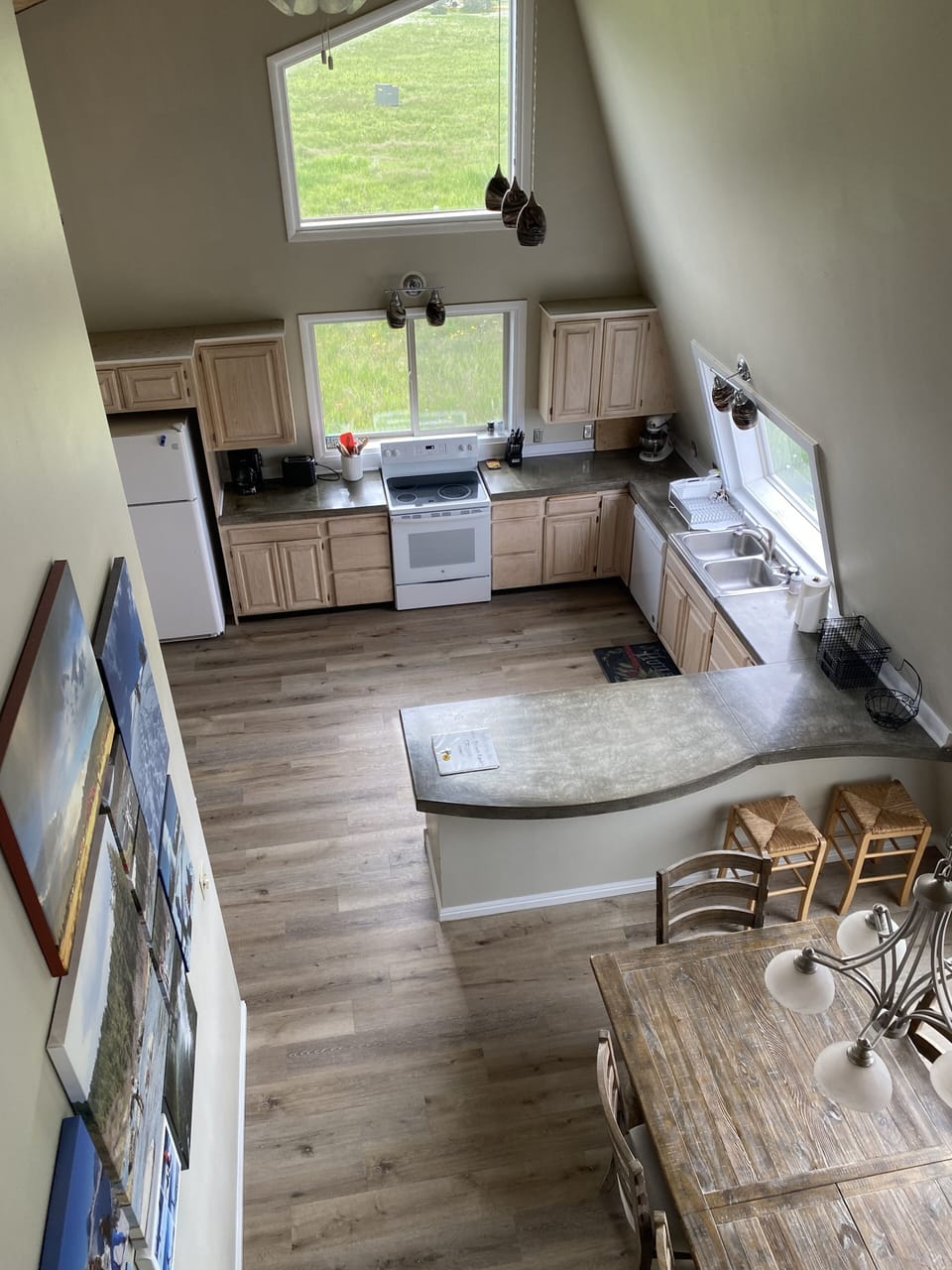 View from loft down to kitchen and dining area.