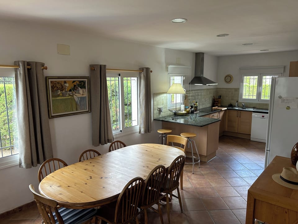 Dining area with seating for up to 10 persons.