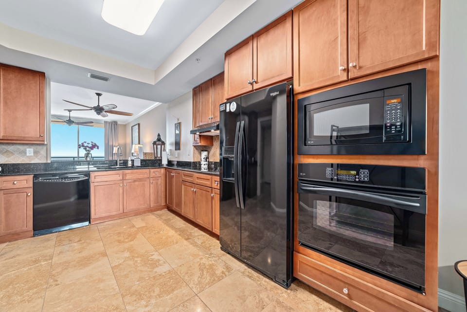 Fully Appointed Kitchen, stocked with multitude of utensils.
