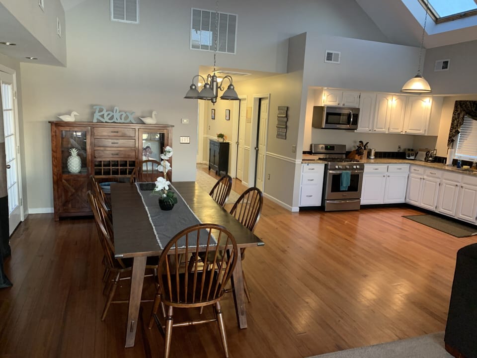 Open floor plan for kitchen, dining room, and living room